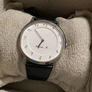Agnès b. Classic silver metal with black leather strap Wristwatch